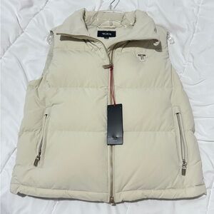 TUMI heat seal quilted midweight prima loft filled vest